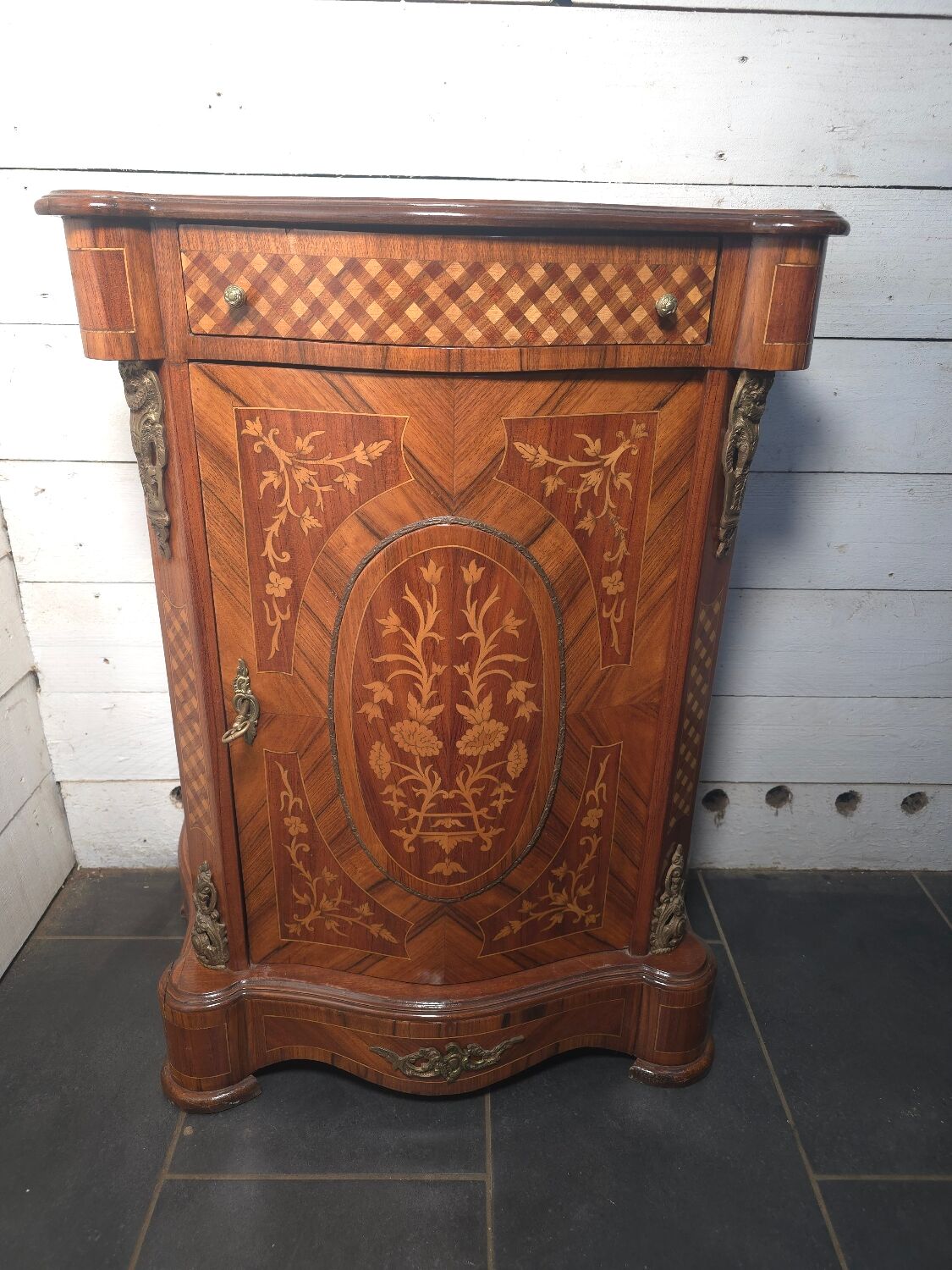 Small support table in Louis XV style with marquetry and bronze.