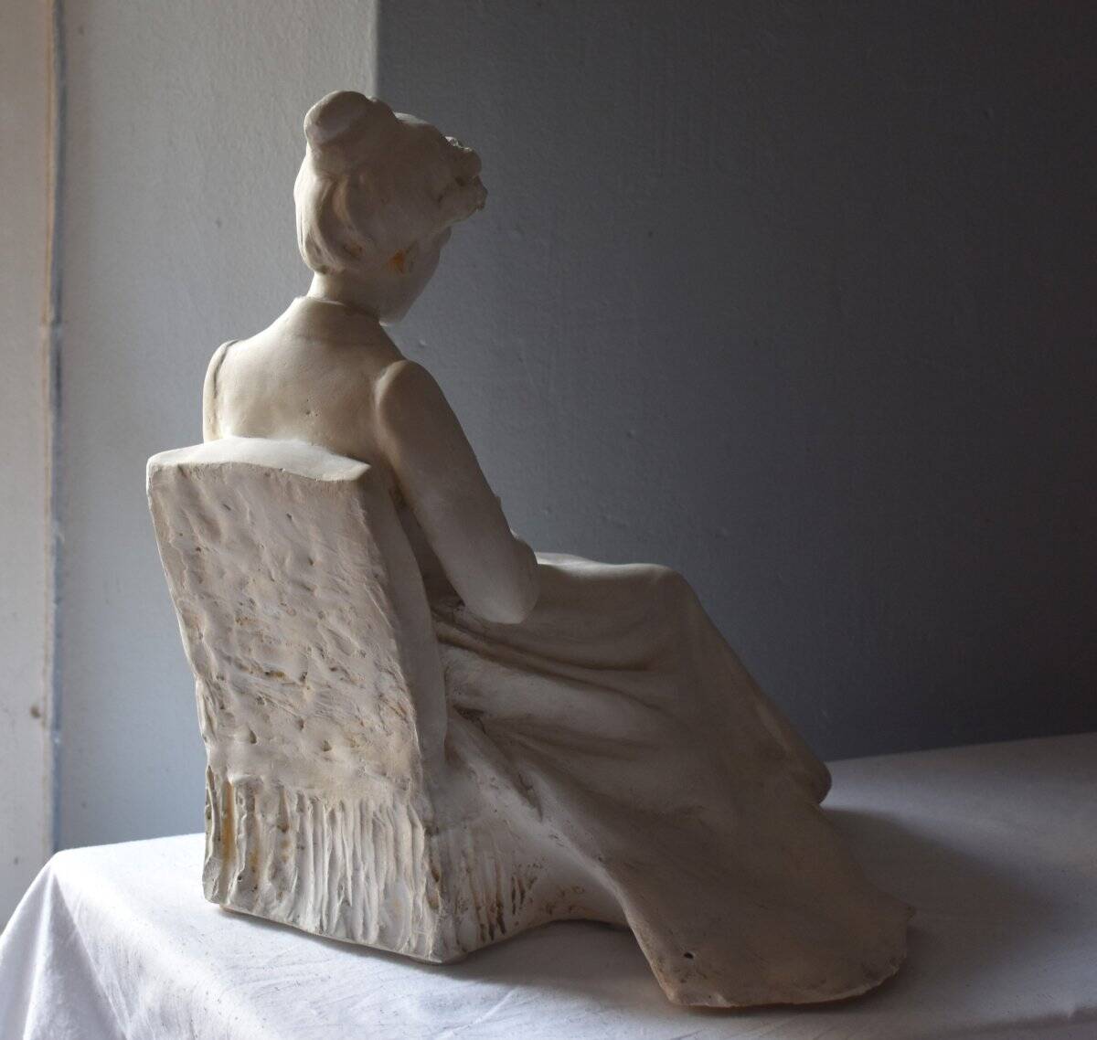 French school, Thoughtful woman sitting on a fringed chair (circa 1910)