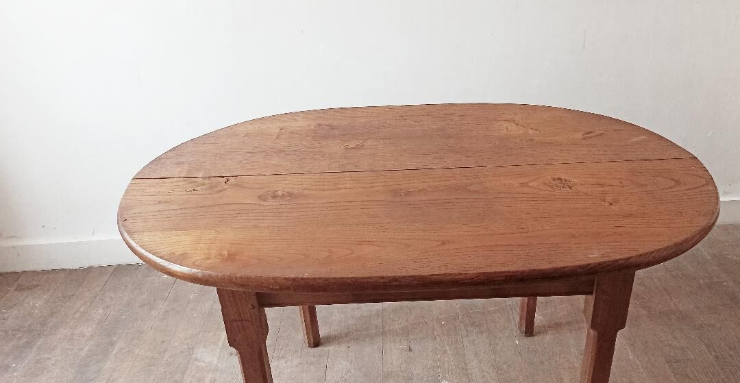 vintage oval dining table made of solid wood