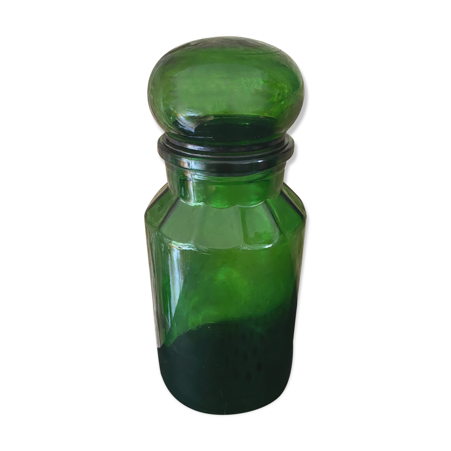 Emerald green glass bottle
