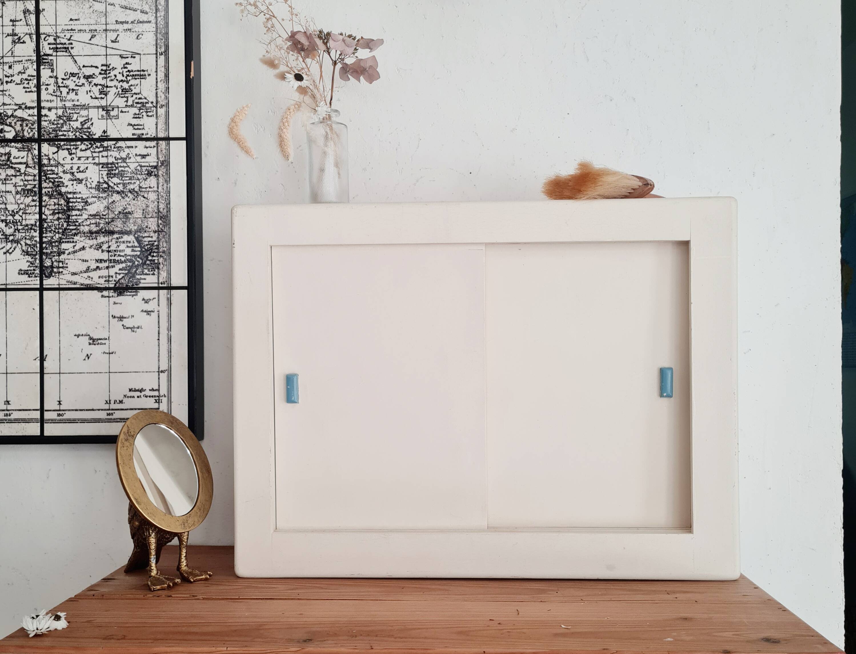 Old white medicine cabinet