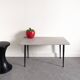 Table basse grise pieds métalliques