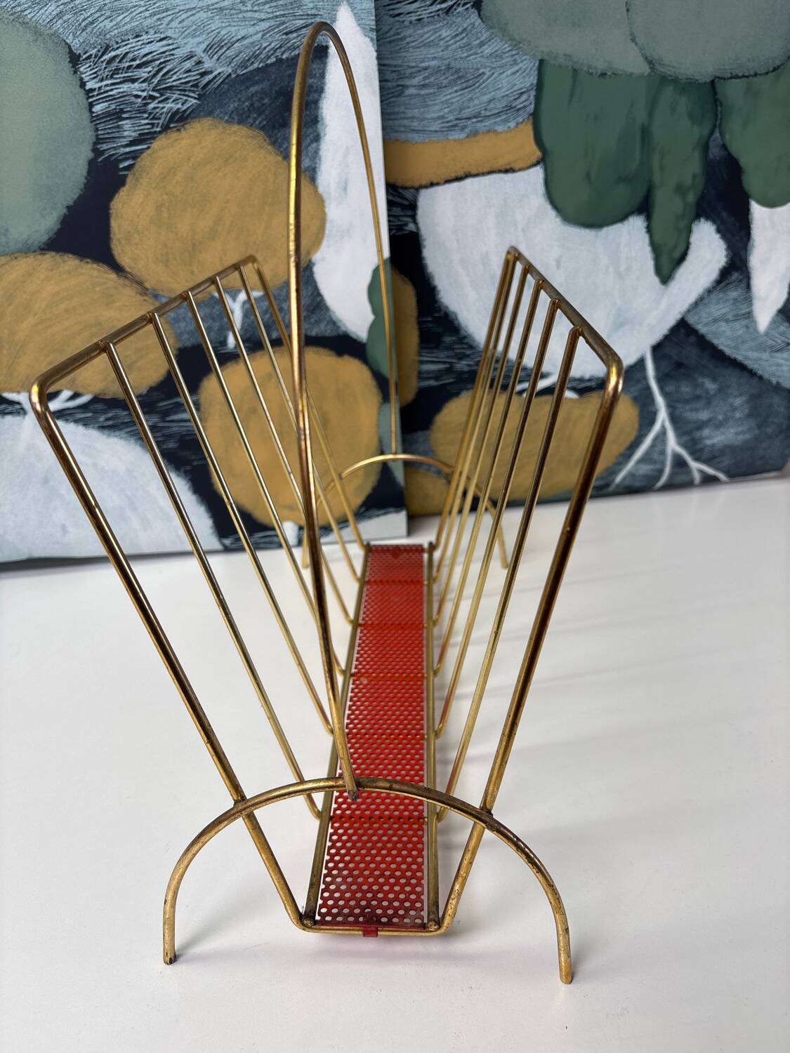 Vintage gold metal magazine rack