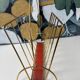 Vintage gold metal magazine rack