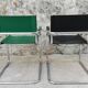 Pair of armchairs, tubular structures and imitation leather