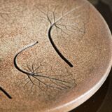 Sandstone trivet, signed