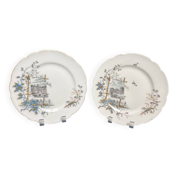 Paire d'assiettes Hache Jullien en faïence fine à décor de château, début XXème