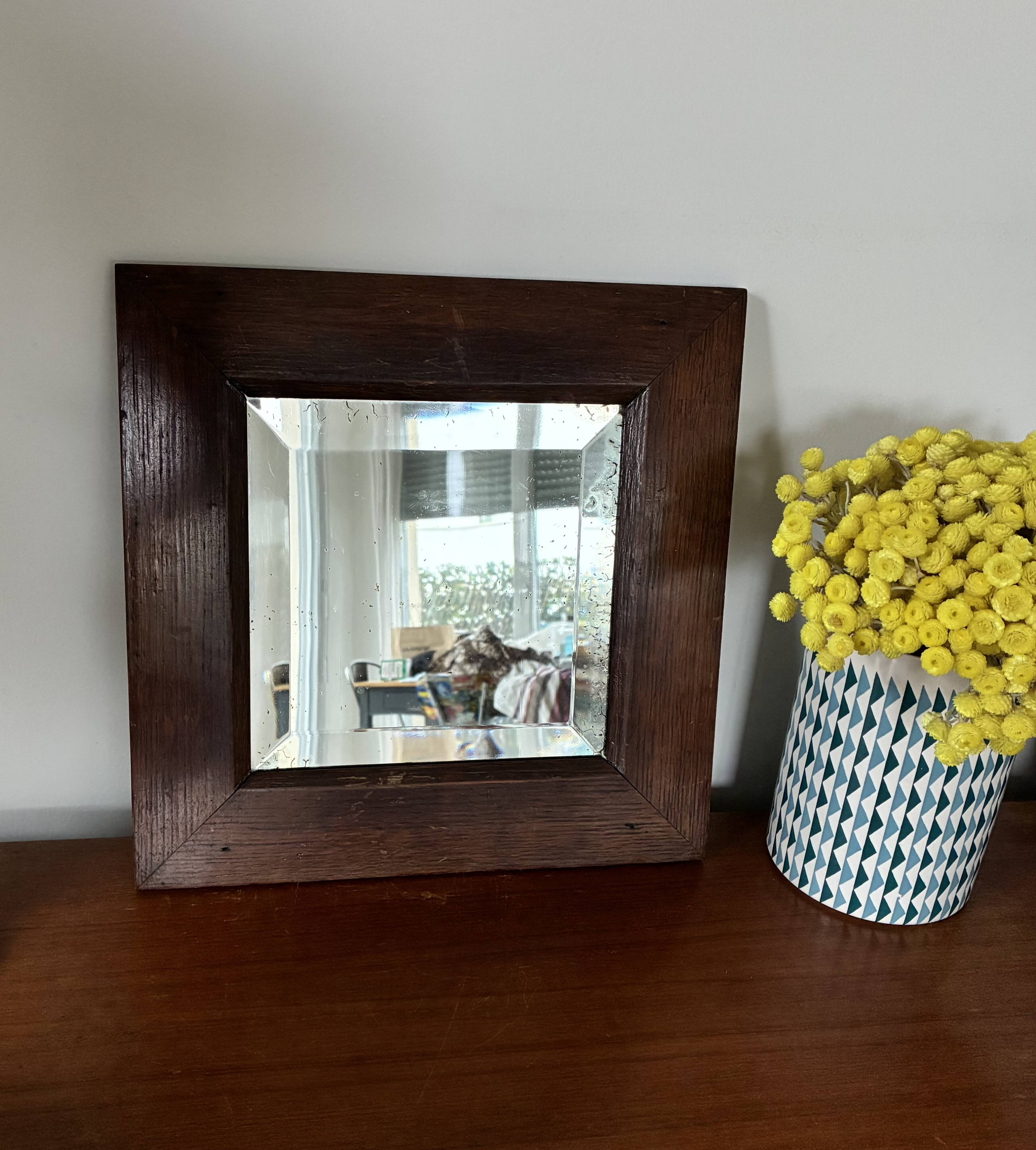 Bevelled mercury mirror with a wooden frame