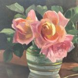 Table bouquet of roses in front of the window