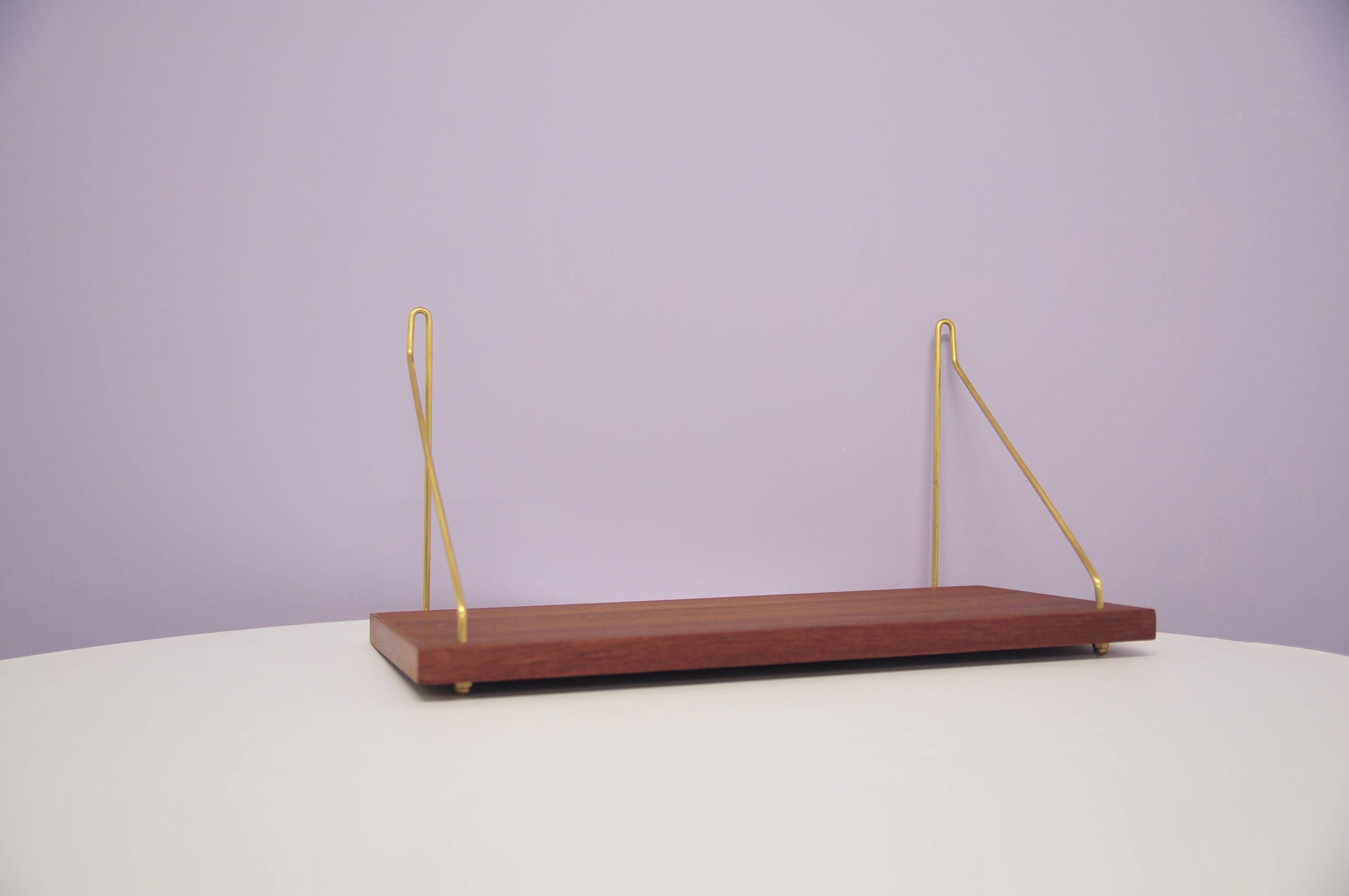 Danish vintage teak wall shelf brass supports