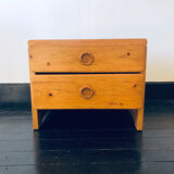 Bedside table assigned to Charlotte Perriand for Les Arcs, in pine, circa 1960.