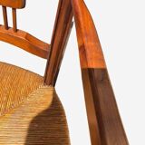 Pair of straw and cherry armchairs