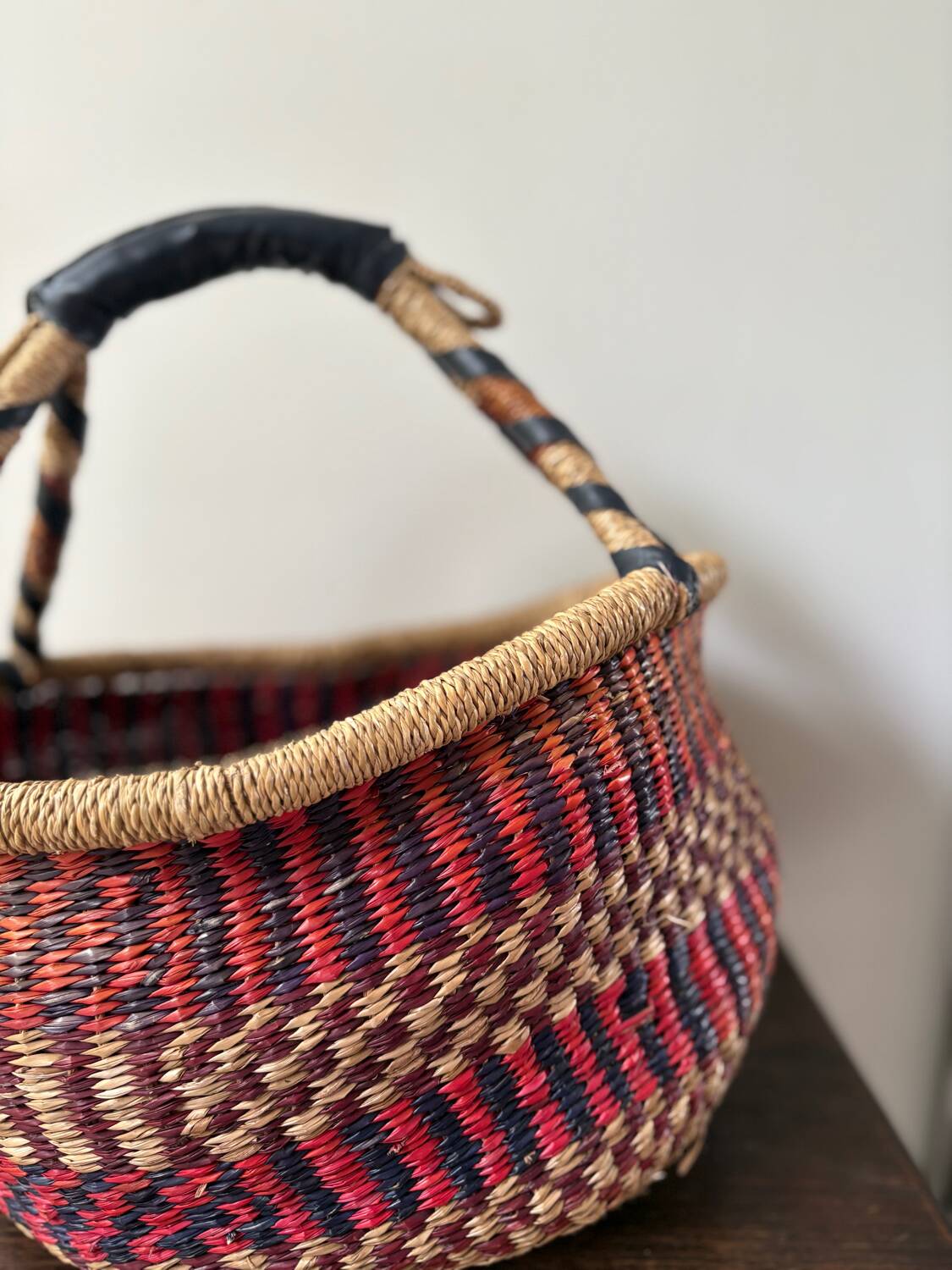 Vintage colorful woven rush ethnic basket
