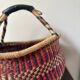 Vintage colorful woven rush ethnic basket