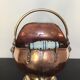 Ancient pink copper pot cover and porcelain handle