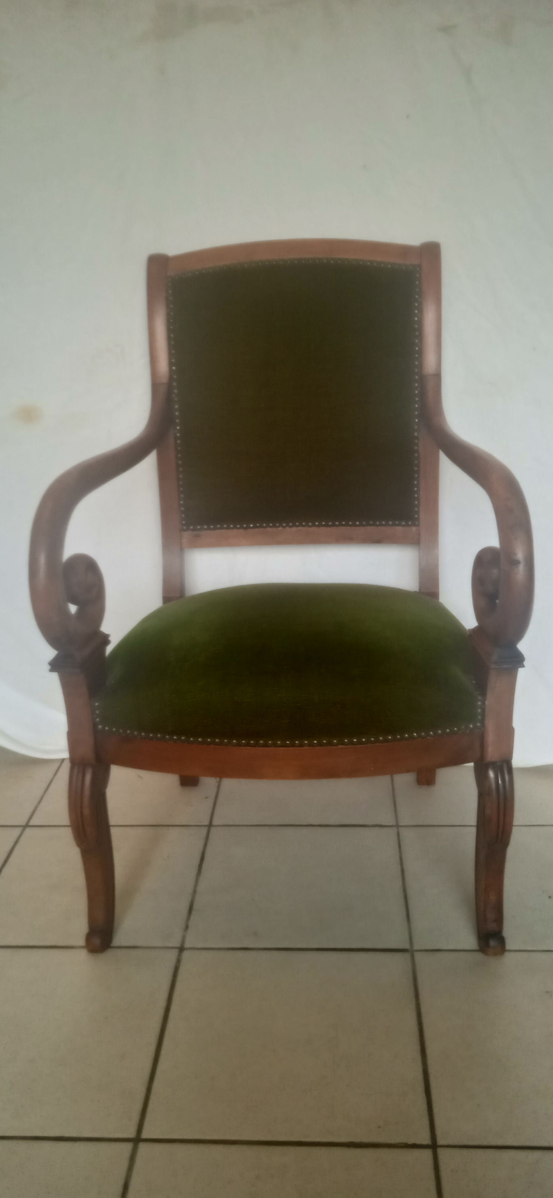 Green velvet armchair