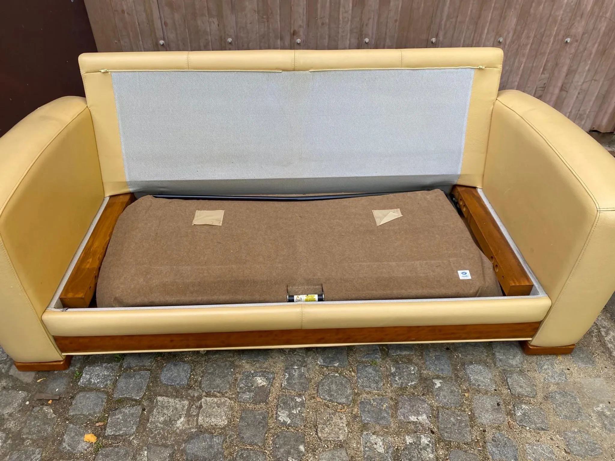 Art Deco 3-seater convertible sofa in genuine beige leather and red fabric from the 1980s.