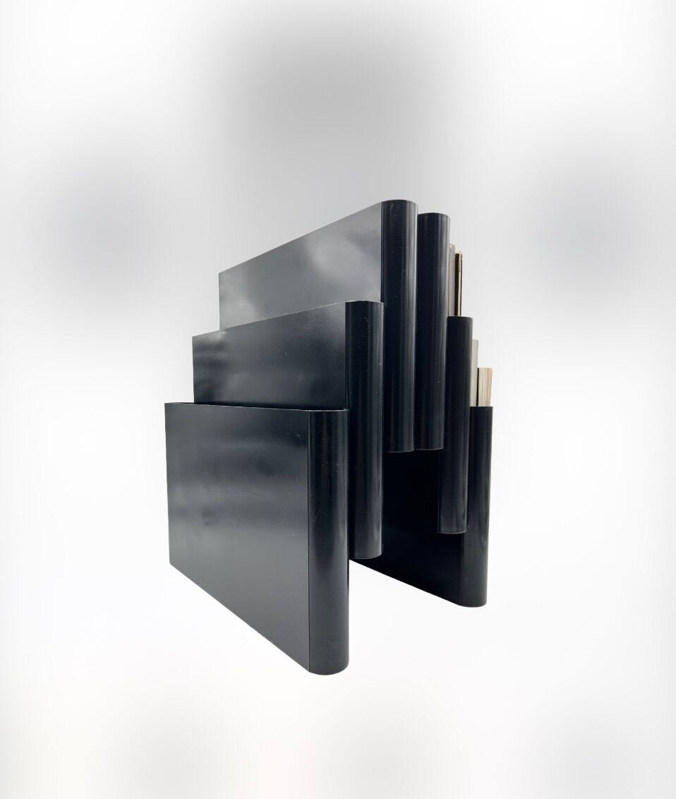 Magazine holder by Giotto Stoppino for Kartell 1970