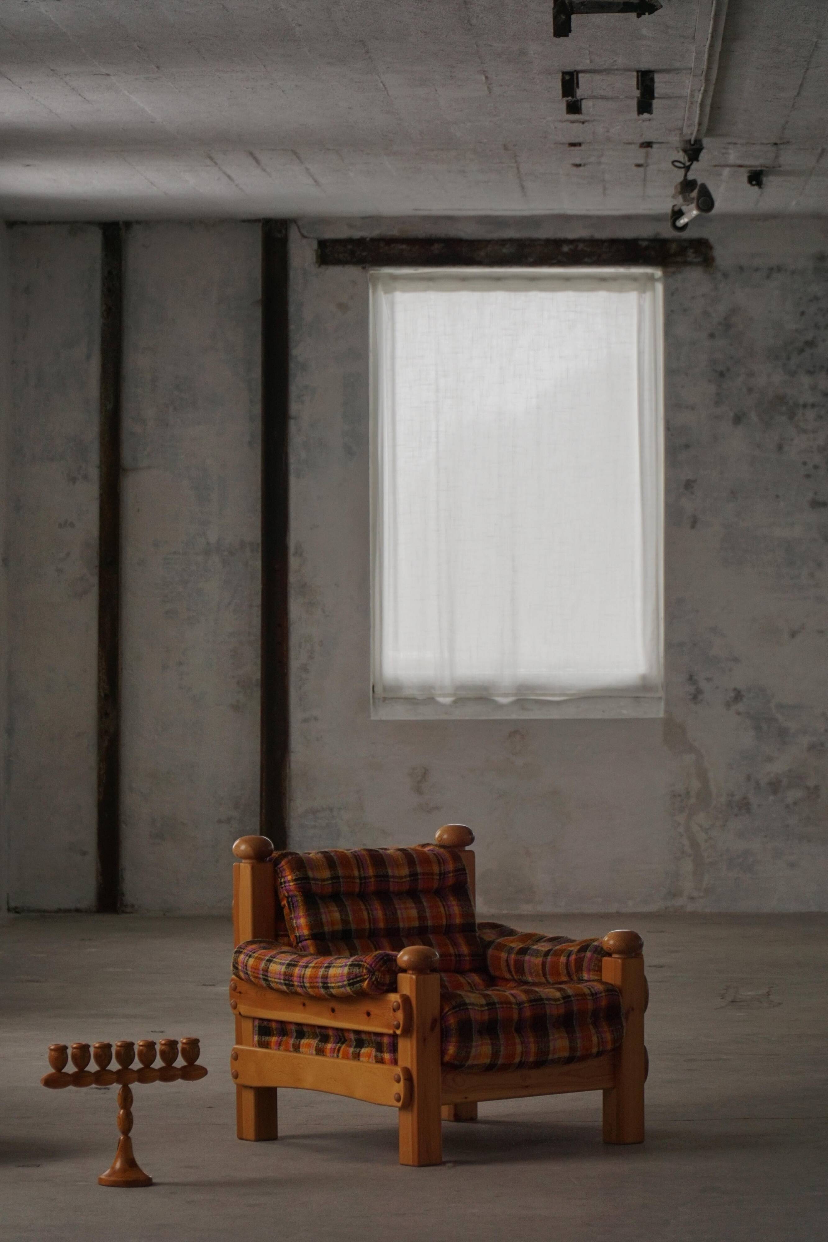 Brutalist lounge chair in solid pine, Swedish modern, made in the 1970s.