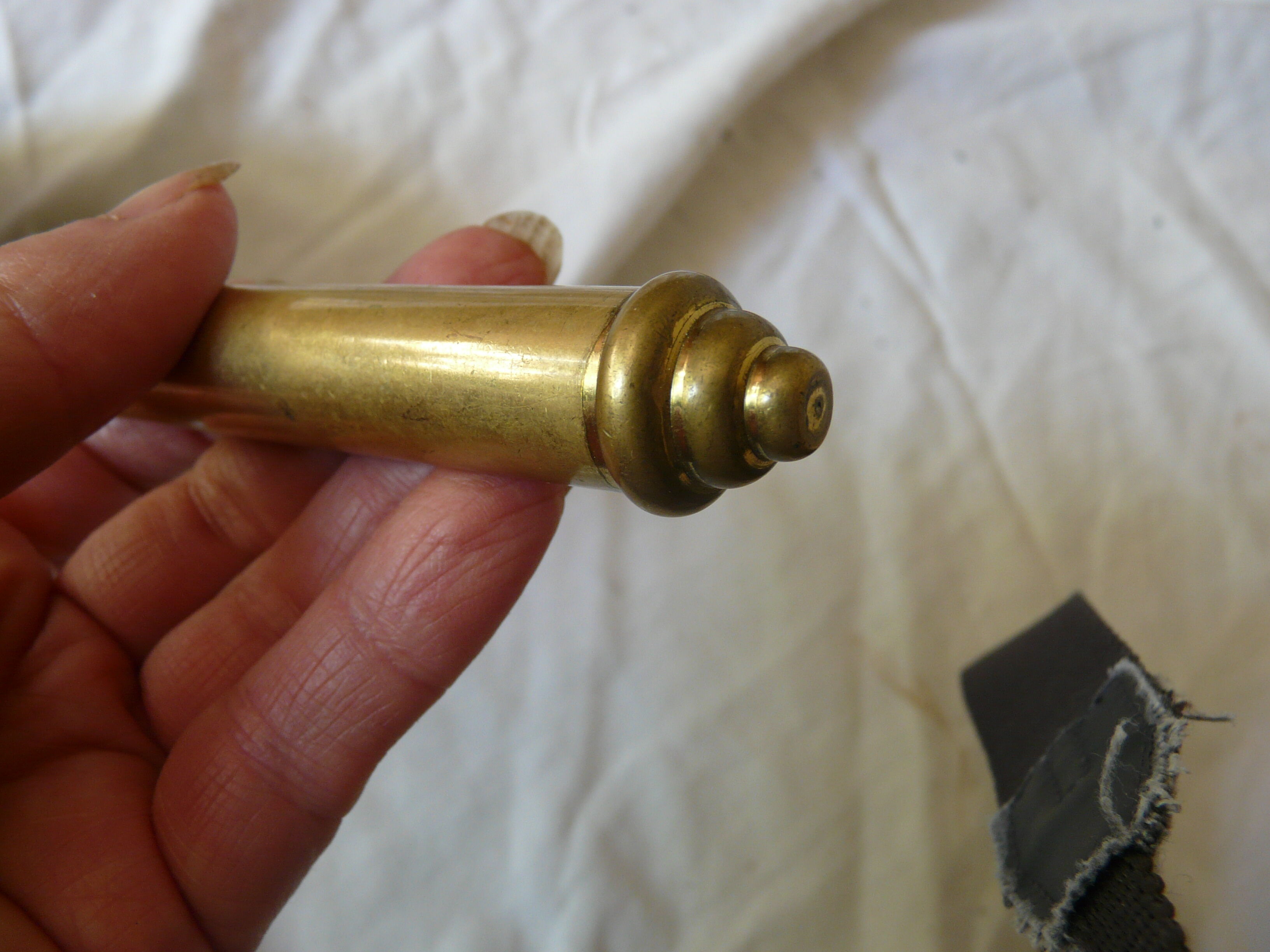 Art Deco era brass hand mirror