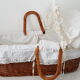 Old rattan bassinet and bedding