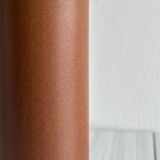 Decorative brown ceramic bottle.