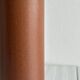 Decorative brown ceramic bottle.