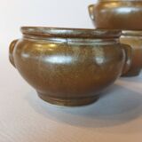4 bowls with handles in gilded stoneware