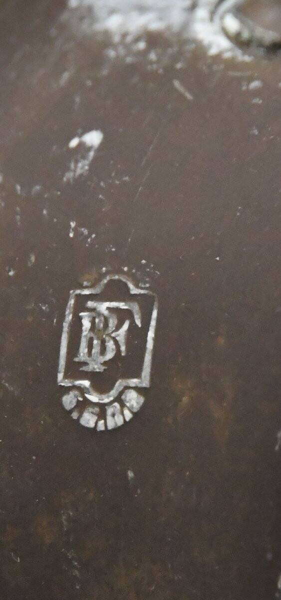 Pair of gilded bronze andirons decorated with serpents.