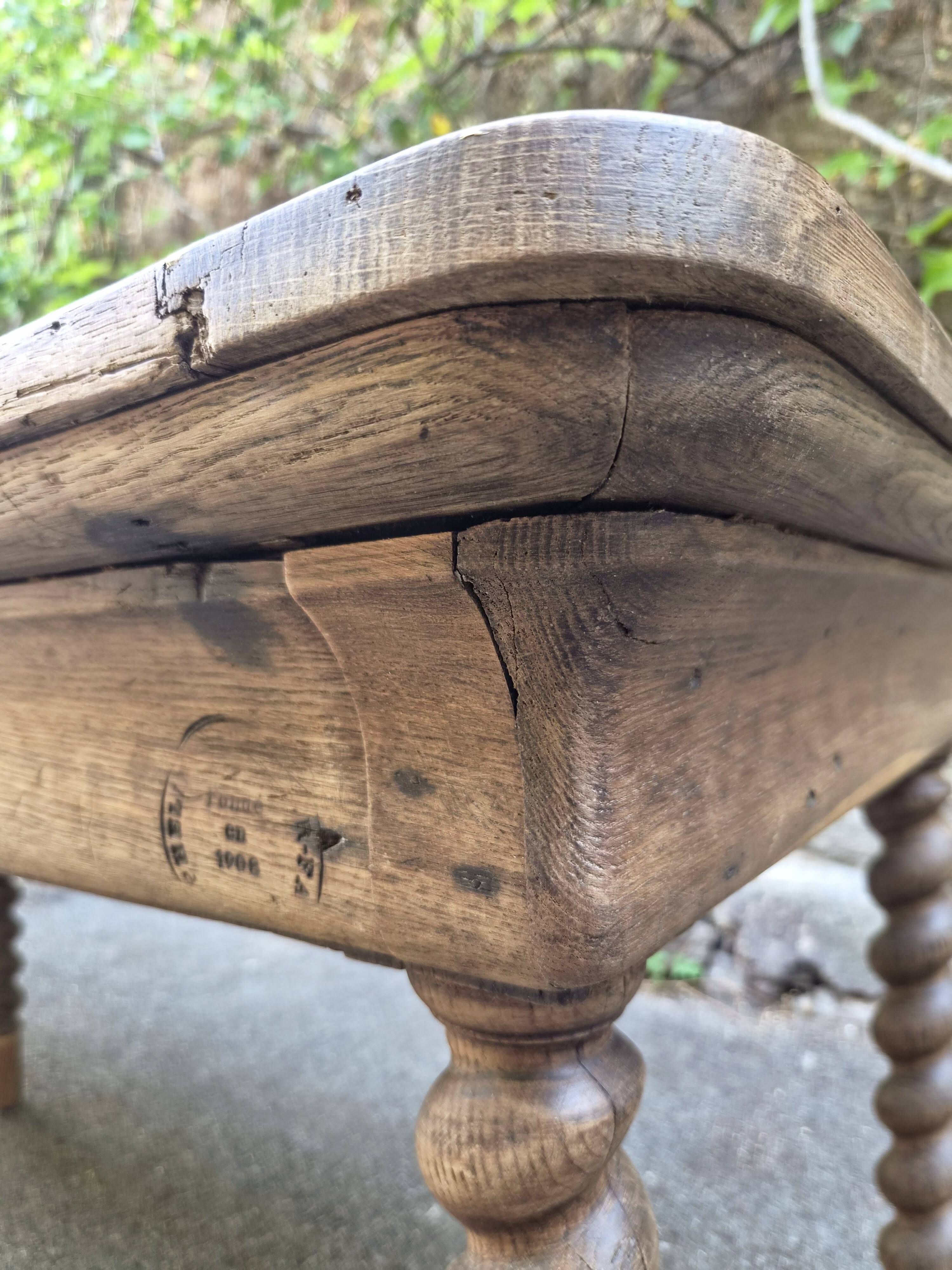 Antique French draper's table in oak, shop counter, work table, 6 feet, circa 1750–1850.