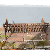 Old gate cradle with cast iron logs