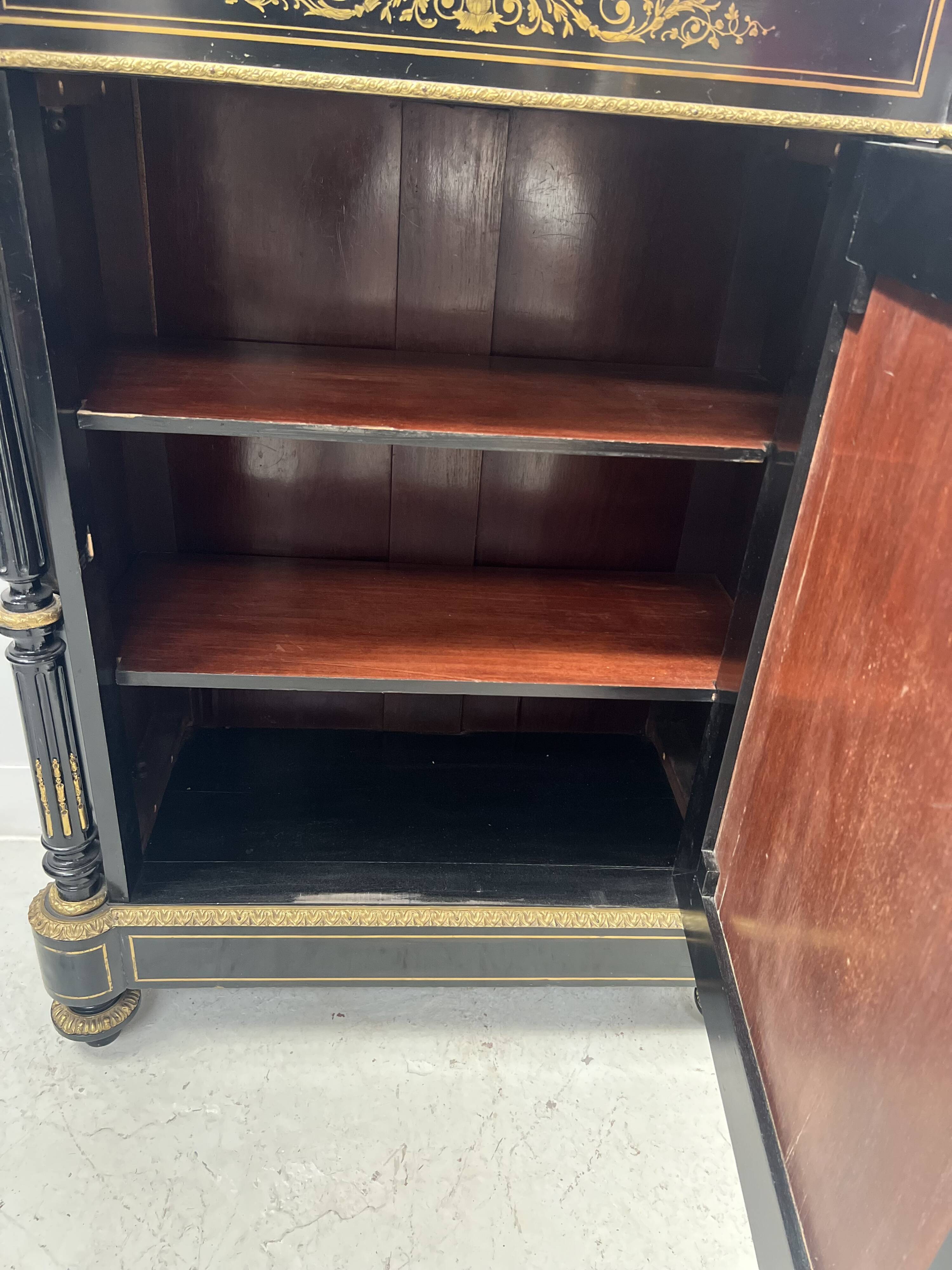 Napoleon III furniture has a black wooden door and brass marquetry 19th century