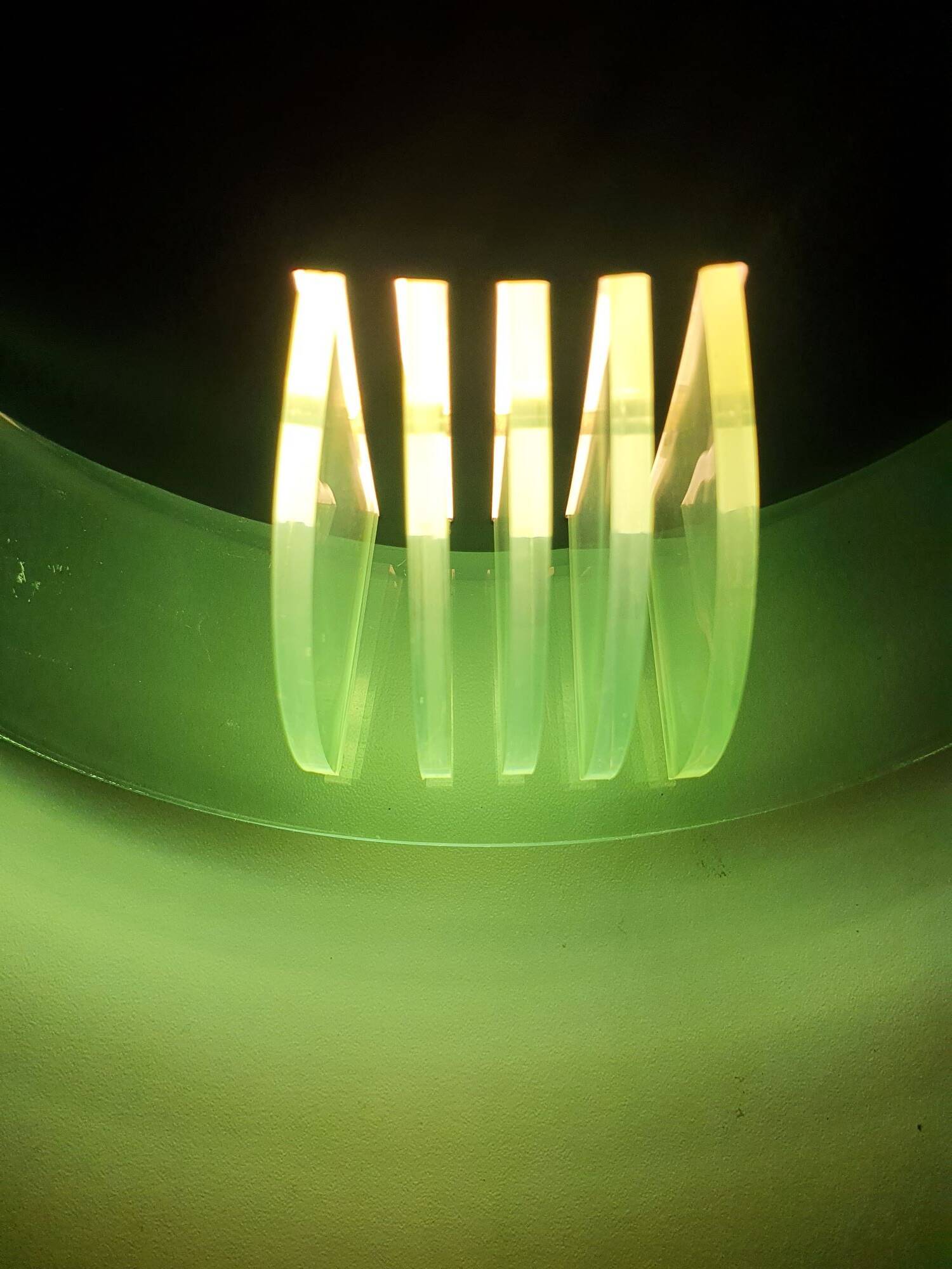 Pair of vintage black metal and plexiglass half-moon wall lights