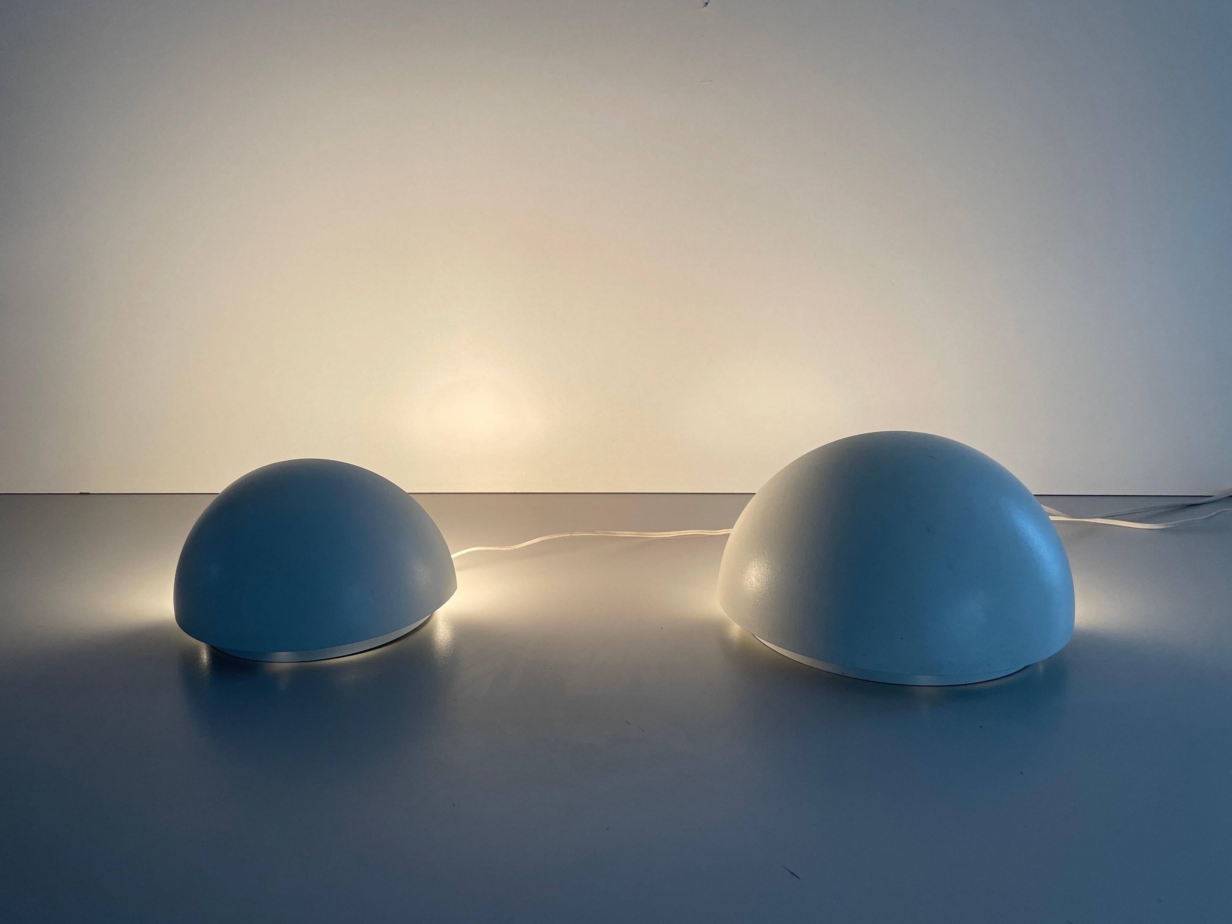 Round wall lights, small and large, in white metal by Bega, 1970s, Germany.