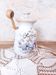 Old large vintage stoneware olive pot with its wooden spoon