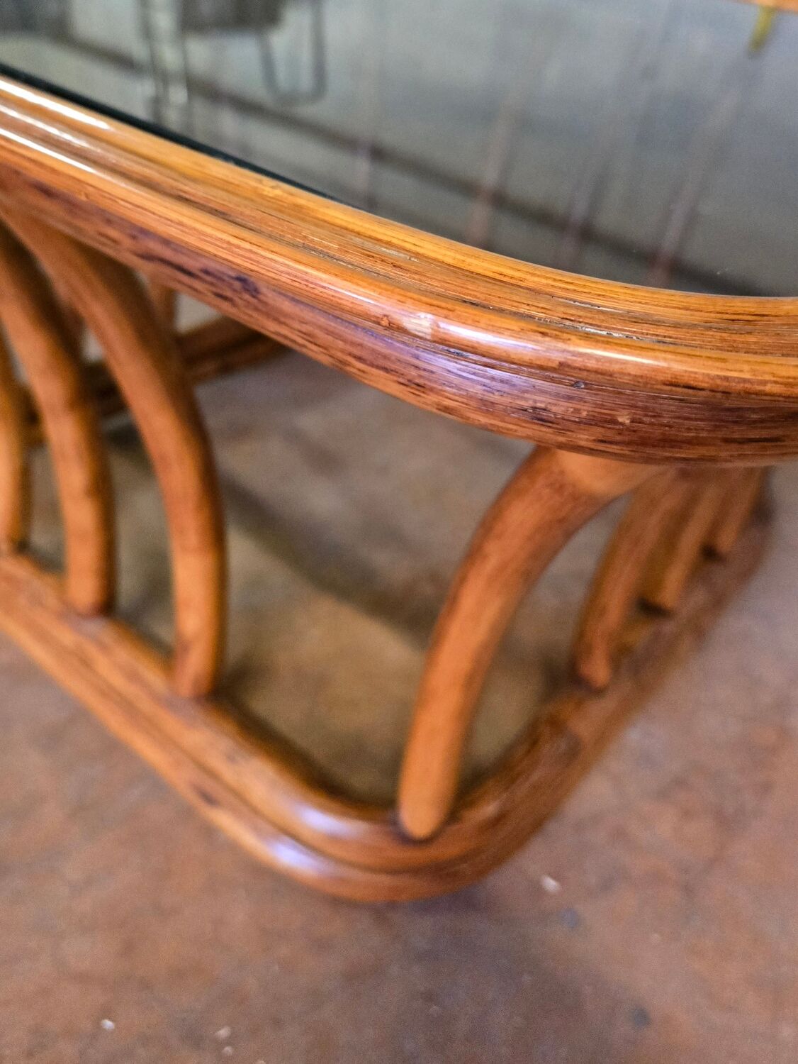 Rattan and smoked glass coffee table, vintage 1970s design.