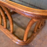 Rattan and smoked glass coffee table, vintage 1970s design.