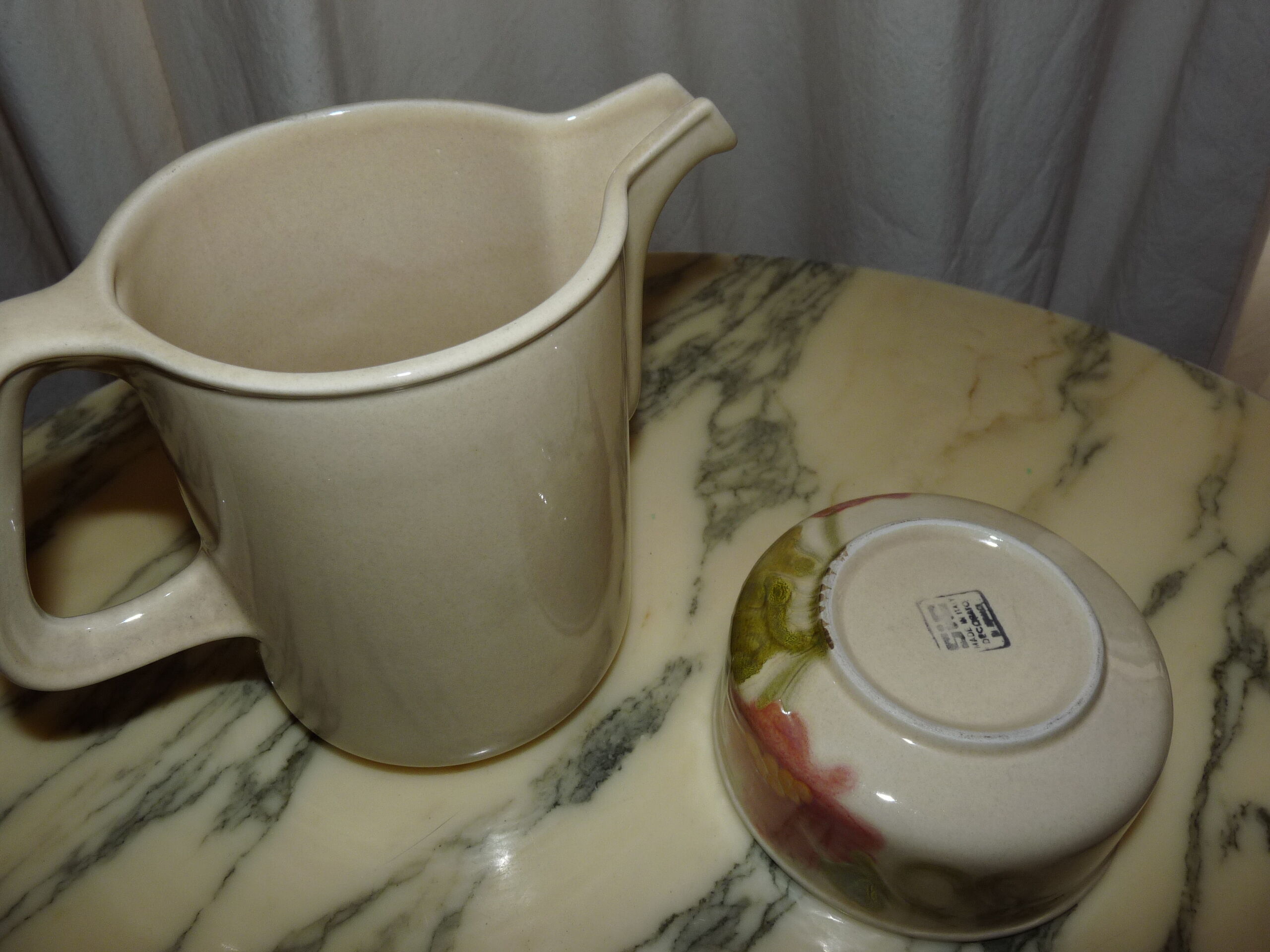Hand-decorated art ceramic water jug and ramekin