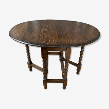 English oak table with late 19th century "gate leg"