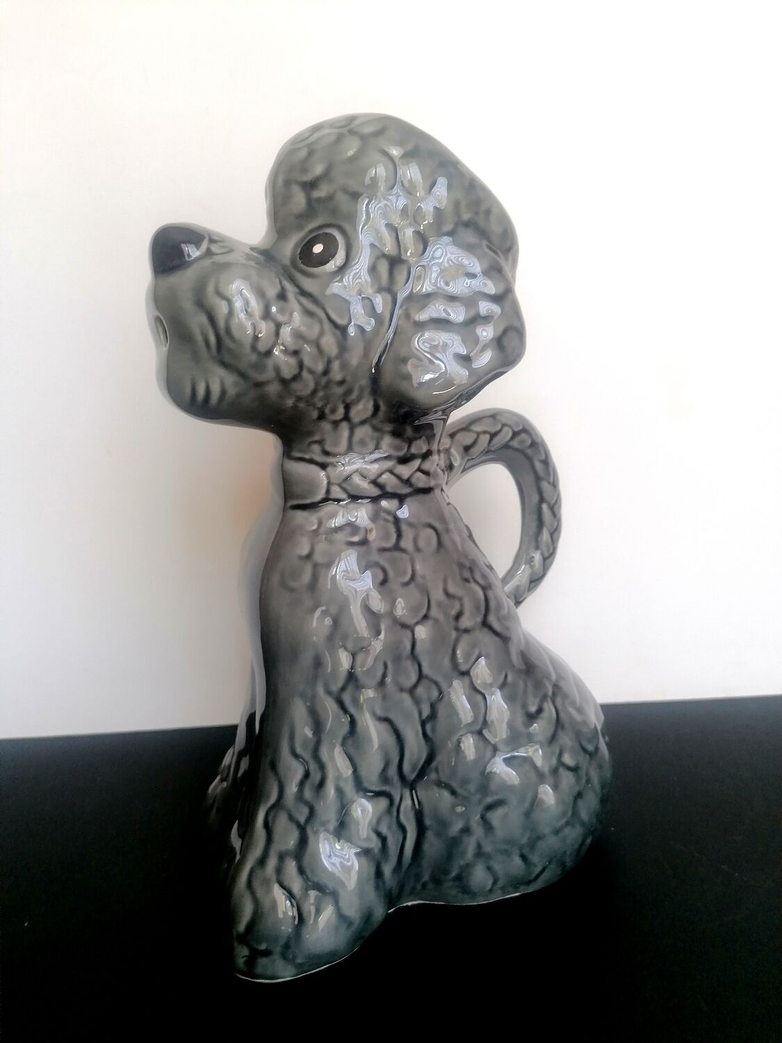 Zoomorphic pitcher slurry poodle