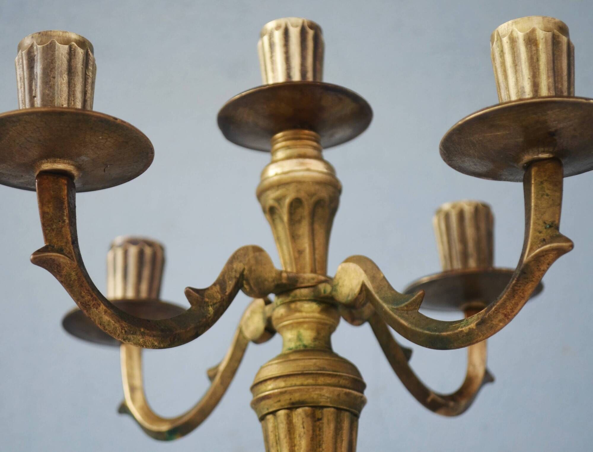 Solid brass candle holder with 5 candles and 4 arms