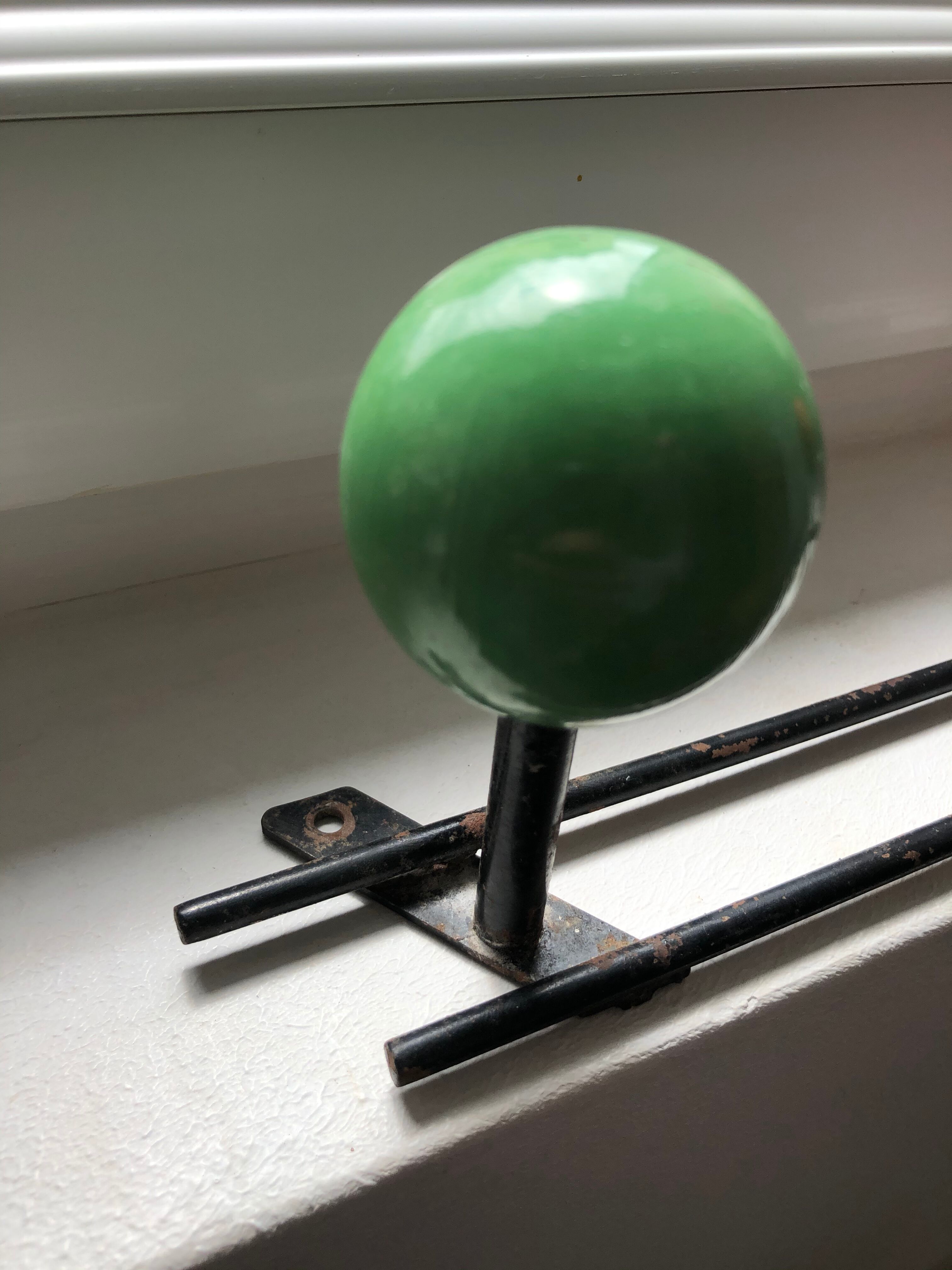 Patère two vintage balls wears old coat