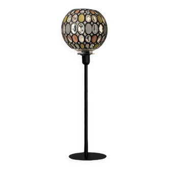 Table lamp with a vintage globe and a black base