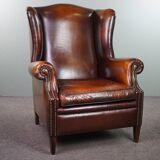 Luxurious large sheep leather wingback armchair with beautiful colors and amazing patina