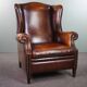 Luxurious large sheep leather wingback armchair with beautiful colors and amazing patina