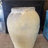 Yellow patinated cement grain jar