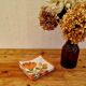 Set of 5 vintage orange flower table napkins from the 70s.