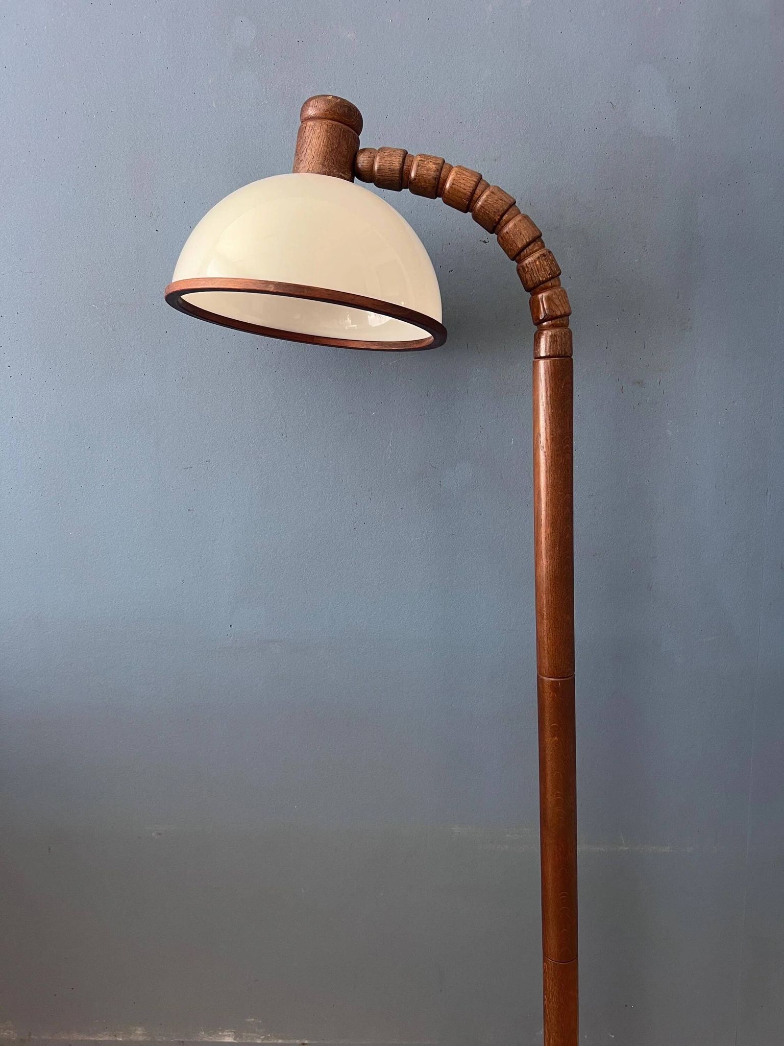 Mid-century floor lamp in brown wood by Steinhauer with an acrylic glass shade.