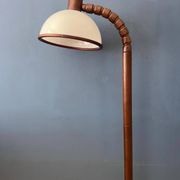 Mid-century floor lamp in brown wood by Steinhauer with an acrylic glass shade.
