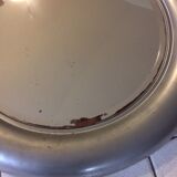 Vintage bright round bathroom mirror in metal